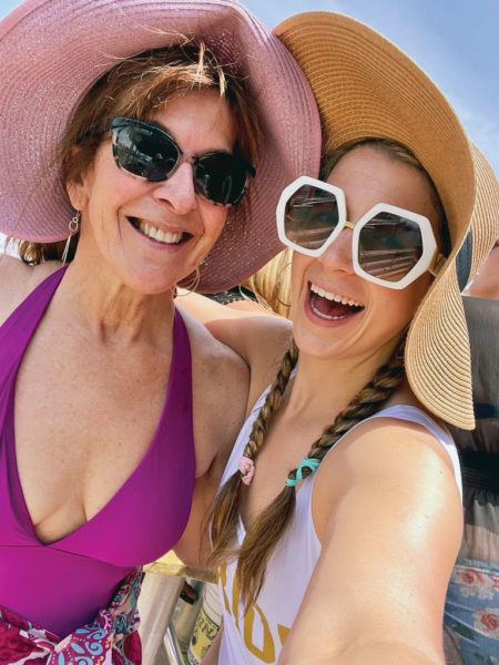 Picture of two women smiling and wearing hats. Victori Kopec and Julia-Batman The Skin Cancer Foundation